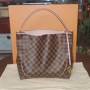 Authentic Louis Vuitton Caissa Hobo